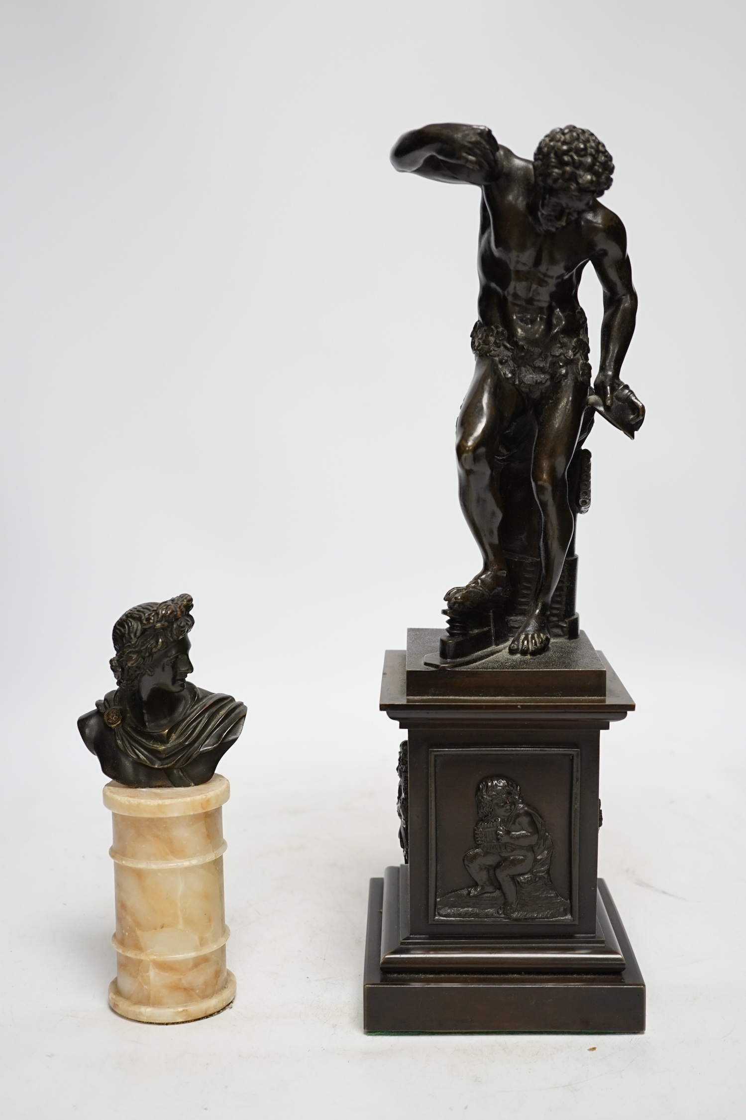 After Isaak Duchemin, a bronze figure of Pan, together with a bust of Apollo, tallest 37cm. Condition - fair